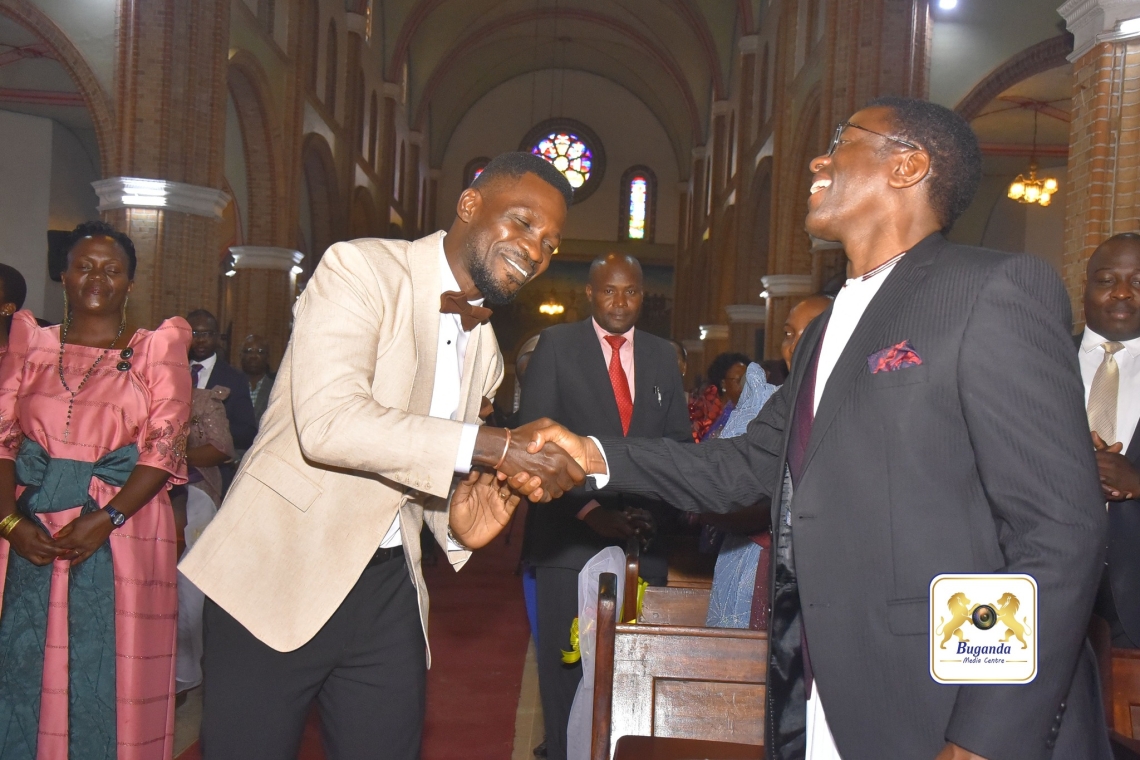 Katikkiro Charles Peter Mayiga warmly greeted Hon. Kyagulanyi Bobi Wine during the Christmas service Image